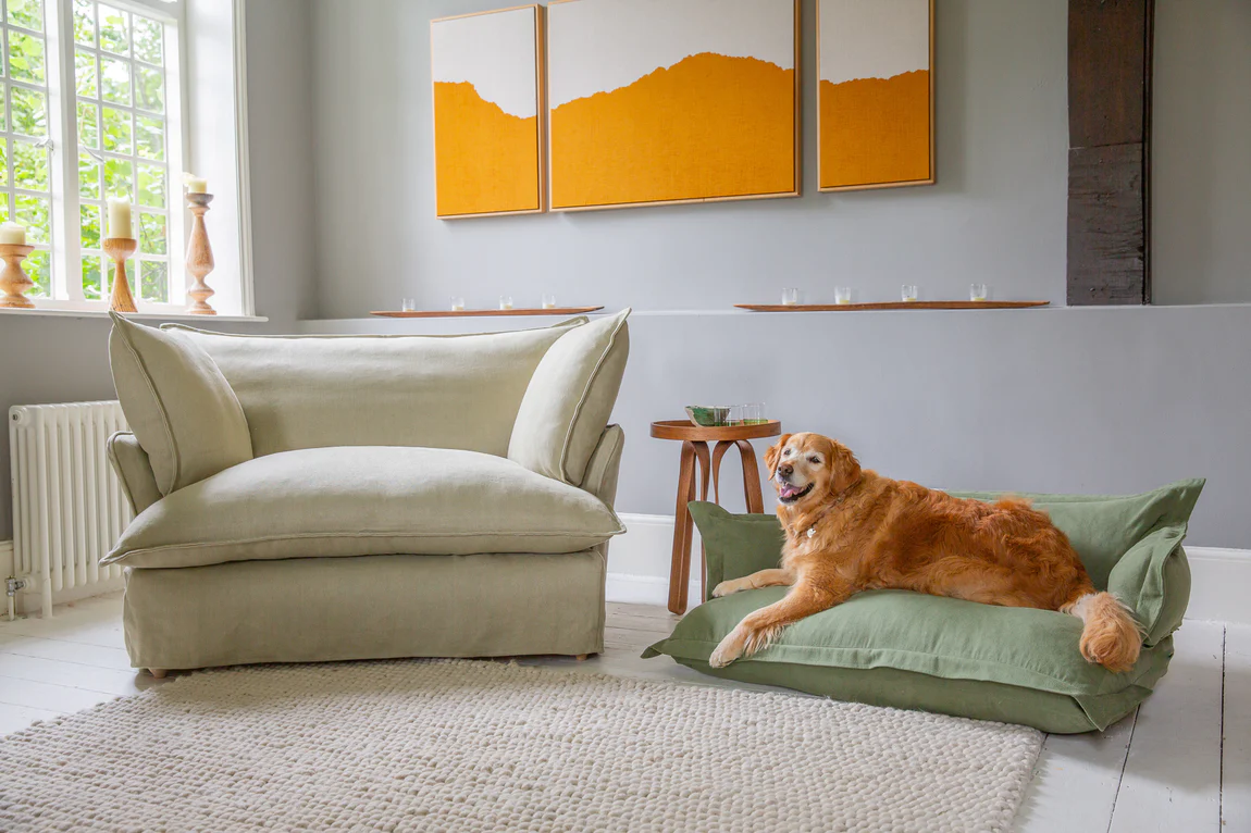 Rosie the Golden Retriever on a large dog bed in Malachite green linen by Maker and Son